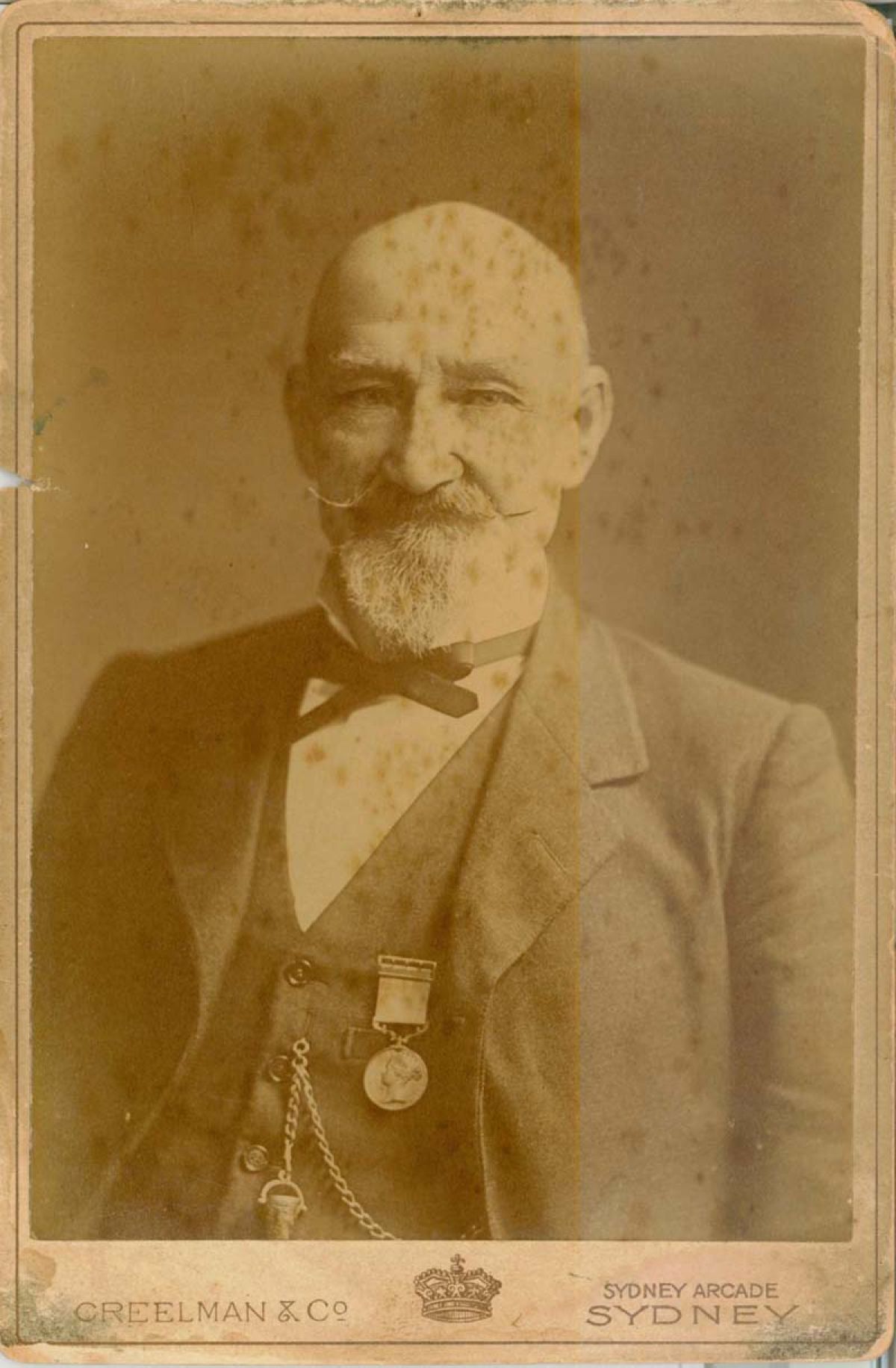 Cabinet photograph of Henry Baylis wearing his bullet (in casket) and medal received for helping to apprehend the bushranger Daniel Morgan, 1898