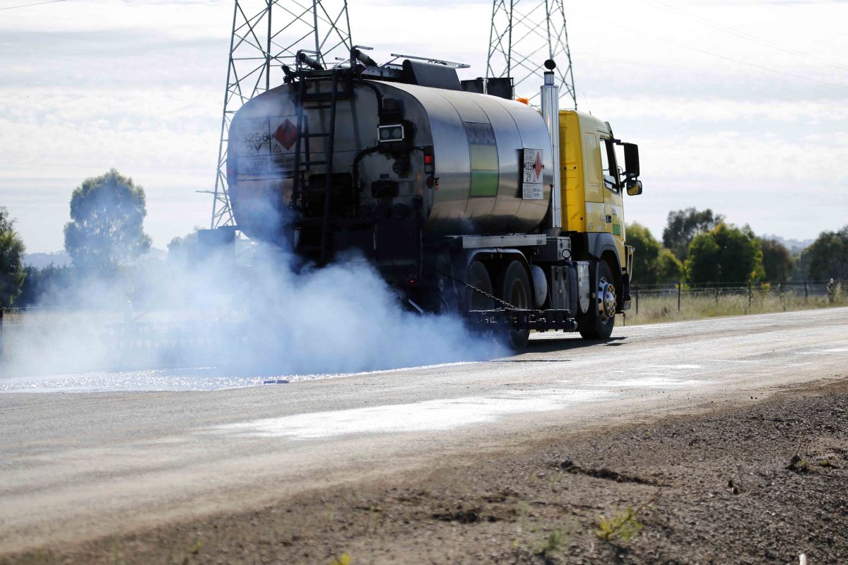 Inglewood Road sealing works - hot bitumen mix being sprayed