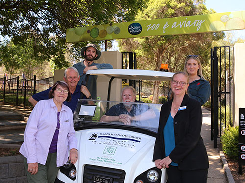ZOOM ZOOM: The Friends of the Wagga Wagga Botanic Gardens representatives Irene (front left) and Bill Toal (centre) handed over the new electric utility vehicle to Wagga Wagga City Council's Mayor Cr Greg Conkey OAM, Louis Reid, Kira McBeath and Director Corporate Services Natalie Te Pohe this week.
