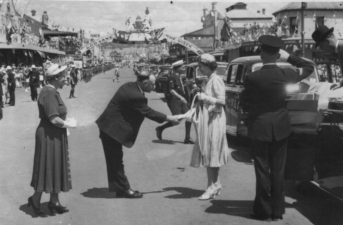 Mayor of Wagga Wagga Alderman W.F. (Bill) Dunne formally welcomes Her Majesty Queen Elizabeth II as she arrived in Baylis Street, outside the Council Chambers, during the Royal Visit on 13 February 1954