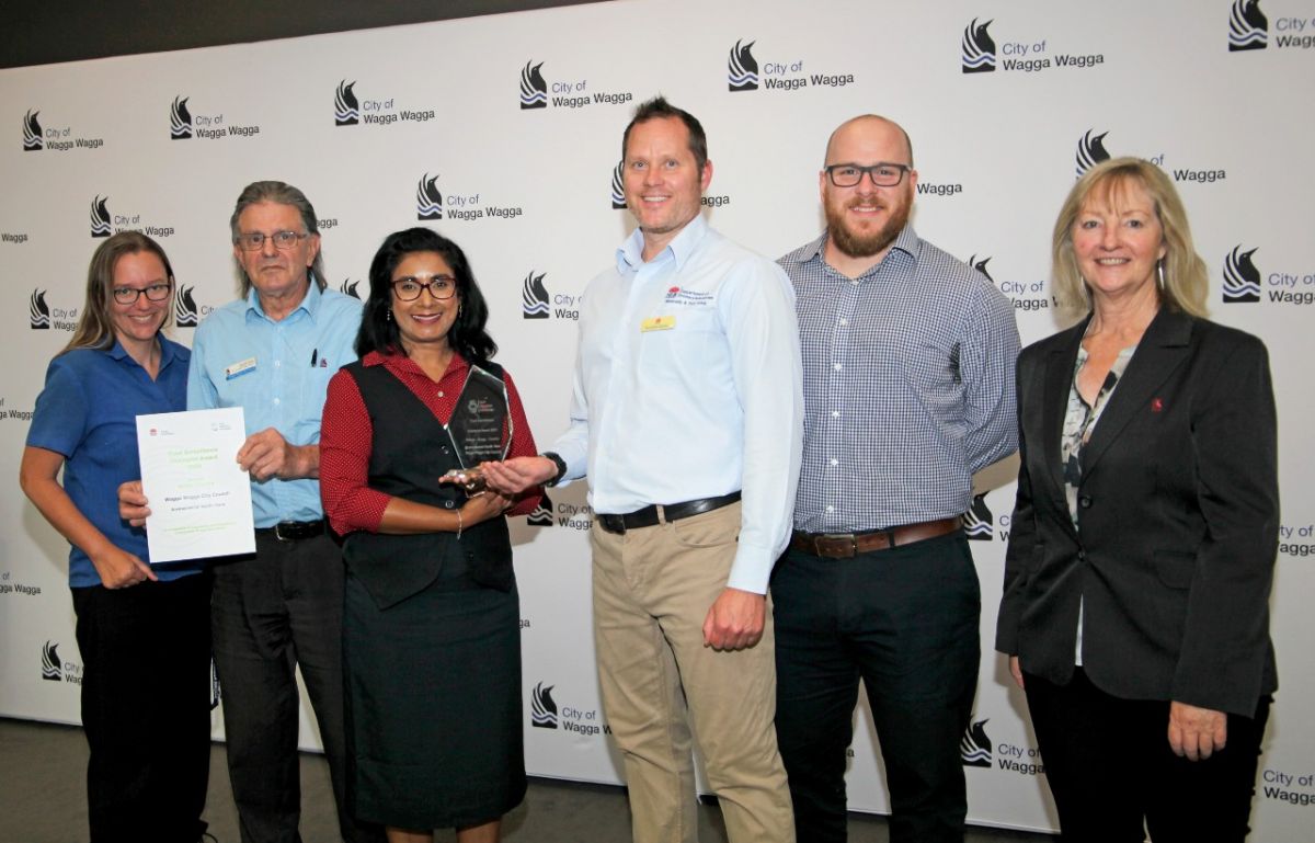 From left, Environmental Health Officers Kate Barraclough and Geoff Lang, Environmental Health Coordinator Sharomi Dayanand, NSW Food Authority Local Government Unit Manager Andrew Davies and Policy Officer Judd Owen, with Deputy Mayor Cr Jenny McKinnon. (Environmental Health Officer Uvindu Warnakoolasuriya absent.) 