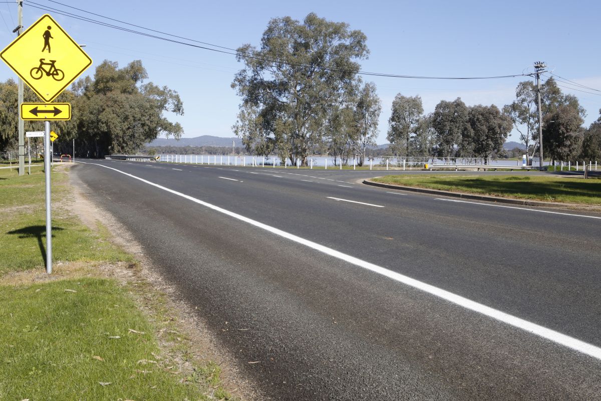 Wide shot image of Lake Albert Rd, on the corner of Lakeside Drive showing the new line markings. 
